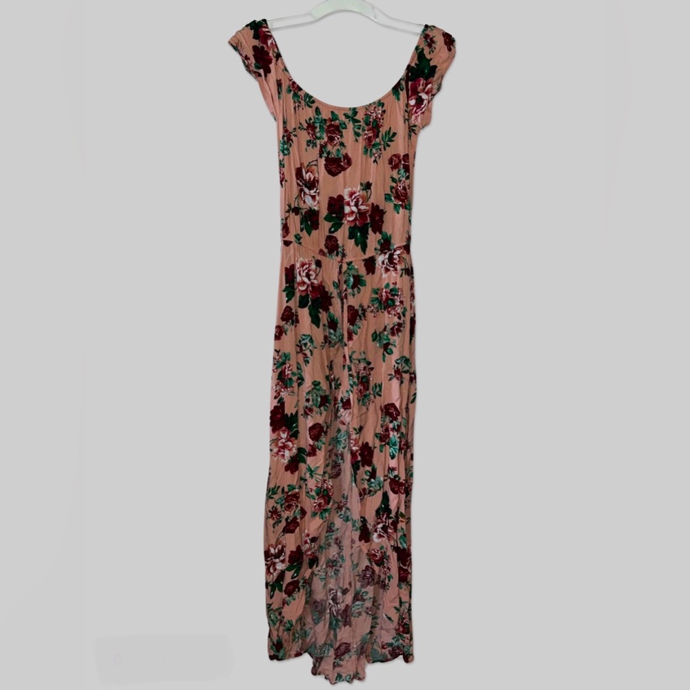Pink floral dress with shorts underneath. Like a romper dress.